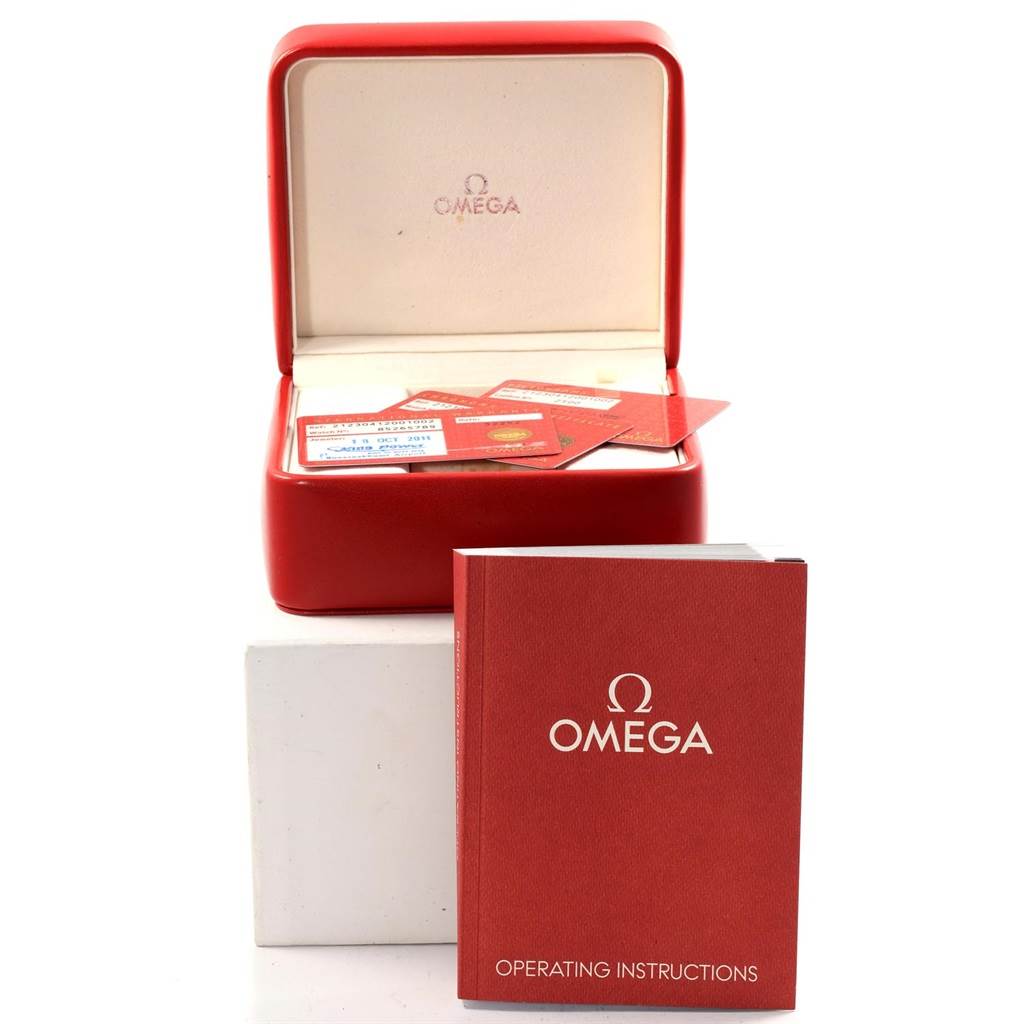 The image shows an Omega Seamaster 212.30.41.20.01.002 Men
s Stainless Steel Black Dial 212.30.41.20.01.002 Men
s Stainless Steel Black Dial watch box, operating instructions manual, and warranty cards.