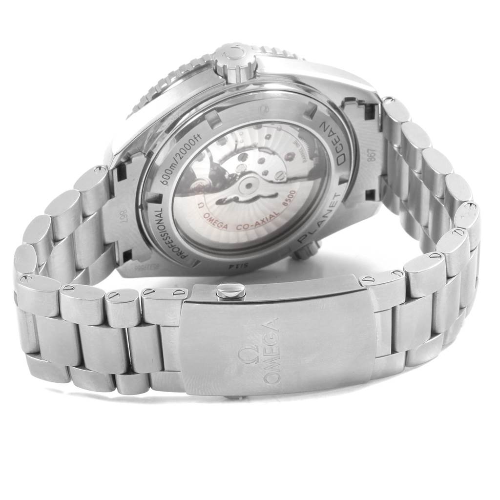 The image shows the back of the Omega Seamaster 232.30.46.21.01.001 Men
s Stainless Steel Black Dial 232.30.46.21.01.001 Men
s Stainless Steel Black Dial watch, highlighting its mechanism and metal bracelet.