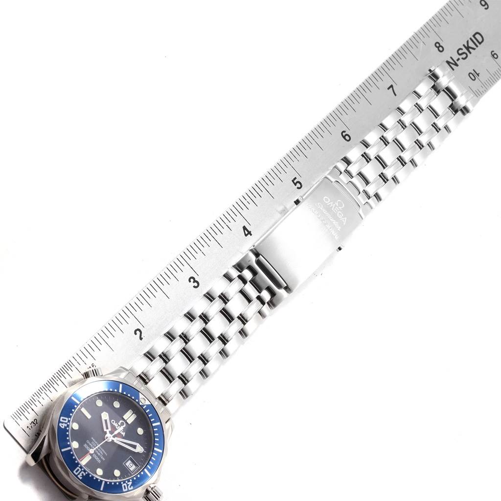 The image shows the face and bracelet of the Omega Seamaster 2222.80.00 Men
s Stainless Steel Blue Dial 2222.80.00 Men
s Stainless Steel Blue Dial watch, positioned next to a ruler for scale.
