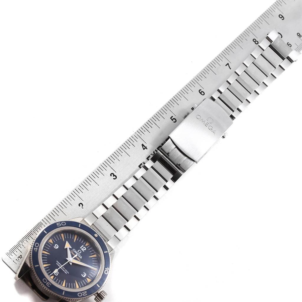 The image shows an Omega Seamaster 233.90.41.21.03.001 Men
s Titanium Blue Dial 233.90.41.21.03.001 Men
s Titanium Blue Dial watch laid flat alongside a ruler, highlighting the face and metal bracelet.
