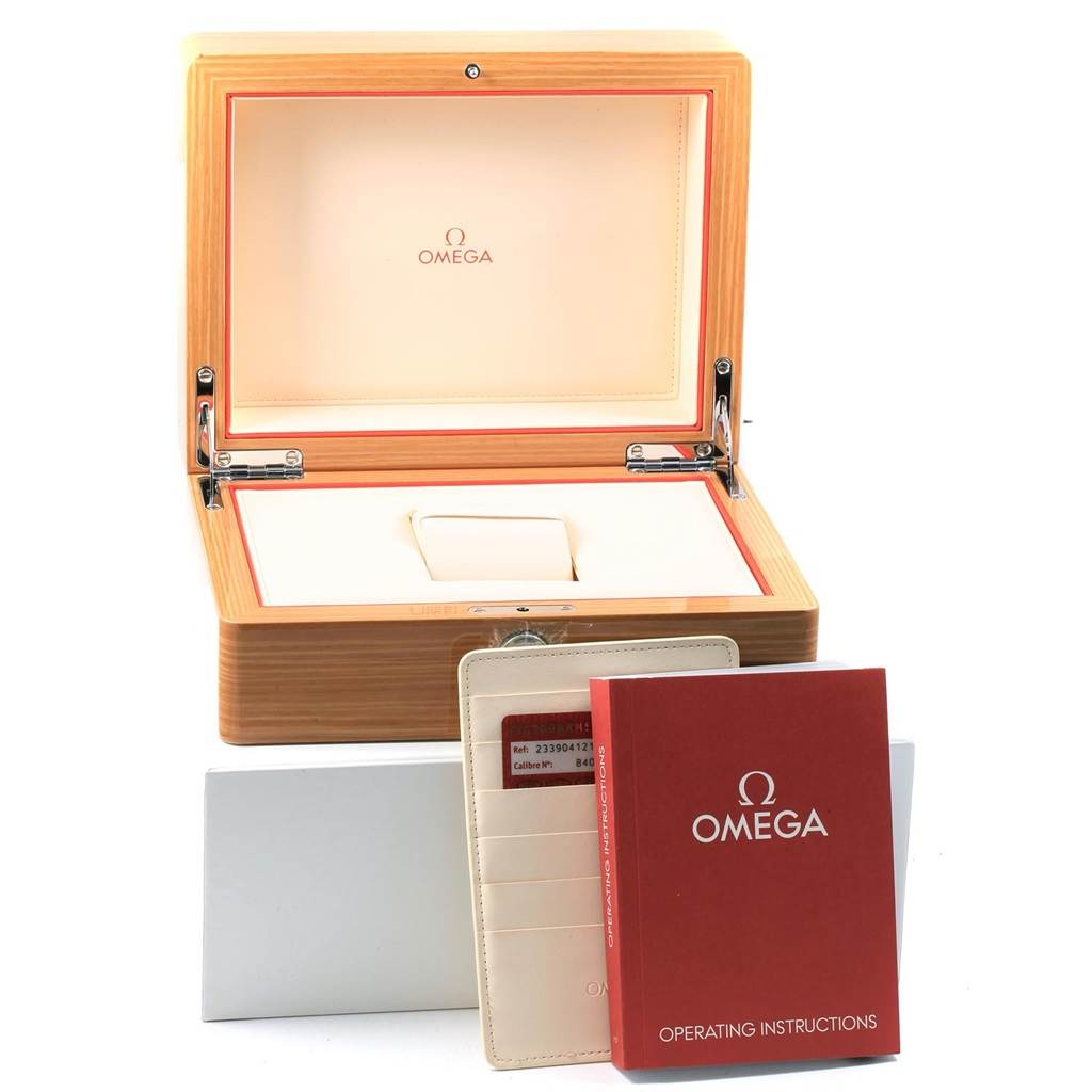 The image shows a wooden box for the Omega Seamaster 233.90.41.21.03.001 Men
s Titanium Blue Dial 233.90.41.21.03.001 Men
s Titanium Blue Dial watch with its operating instructions and cardholder.