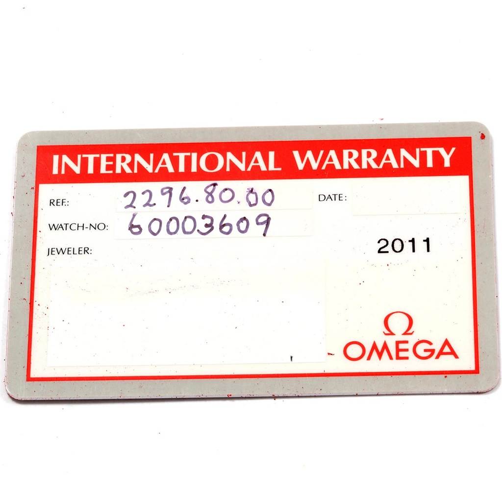This is the International Warranty card for an Omega Seamaster 2296.80.00 Men
s Titanium Blue Dial 2296.80.00 Men
s Titanium Blue Dial watch, shown from a top-down angle.