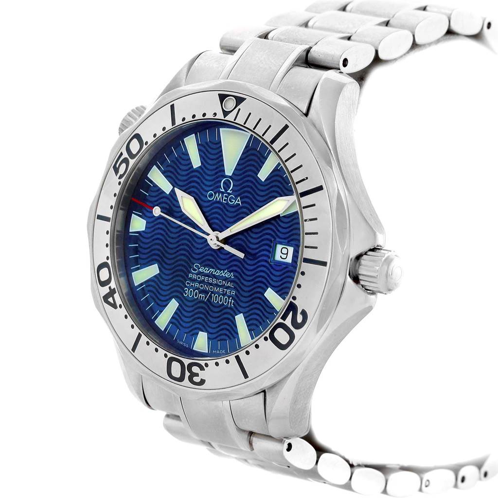 The image shows a side angle of an Omega Seamaster 2255.80.00 Men
s Stainless Steel Blue Dial 2255.80.00 Men
s Stainless Steel Blue Dial watch, highlighting its blue dial, bezel, crown, and stainless steel bracelet.