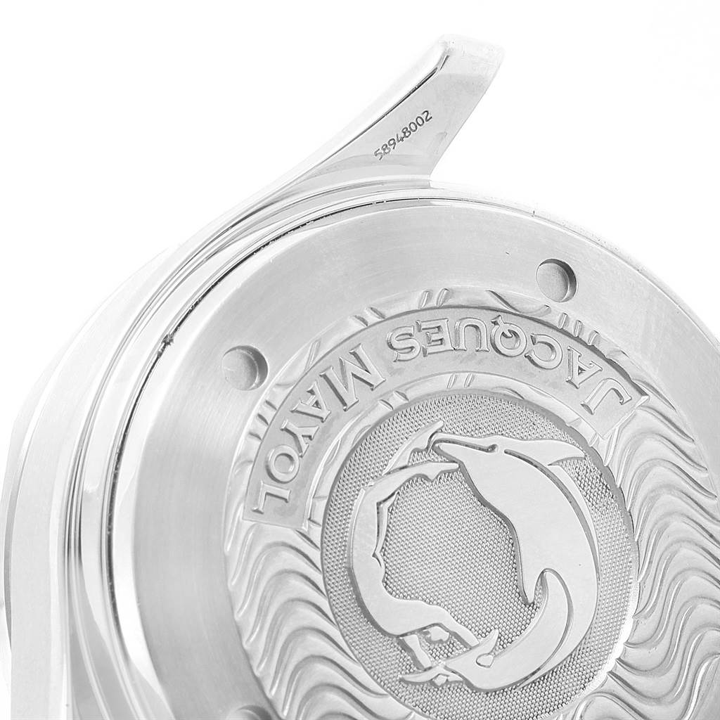 The image shows the engraved case back of an Omega Seamaster 2595.30.00 Men
s Stainless Steel Silver Dial 2595.30.00 Men
s Stainless Steel Silver Dial watch, featuring a dolphin design and "Jacques Mayol" text.