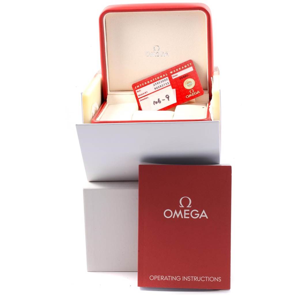 The image shows Omega Seamaster 2595.30.00 Men
s Stainless Steel Silver Dial 2595.30.00 Men
s Stainless Steel Silver Dial watch accessories, including the box, warranty card, and operating instructions from a frontal angle.