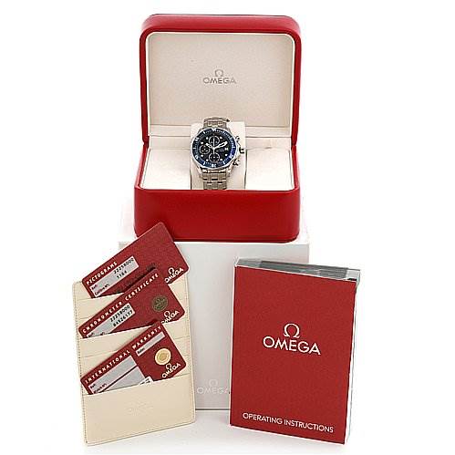 The image shows an Omega Seamaster 22258000 OR 2225.   80.   00 Men's Stainless Steel Blue Dial 22258000 OR 2225.   80.   00 Men's Stainless Steel Blue Dial watch in its box, accompanied by operating instructions and authenticity cards.