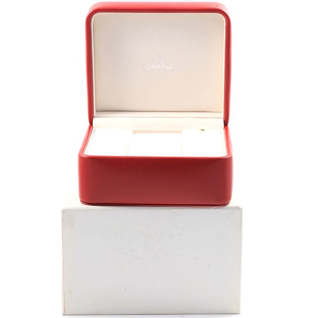 The image shows an Omega Seamaster 2594.50.00 Men
s Stainless Steel Black Dial 2594.50.00 Men
s Stainless Steel Black Dial watch box in red with the lid open, displaying its padded interior.