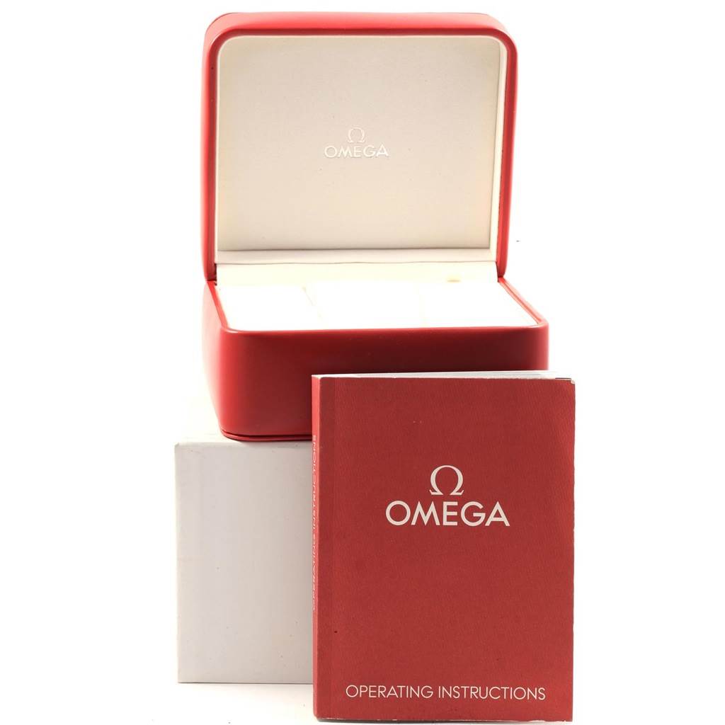 The image shows the Omega Seamaster 2234.50.00 Men
s Stainless Steel Black Dial 2234.50.00 Men
s Stainless Steel Black Dial watch box and operating instructions manual, both in red, photographed from the front.