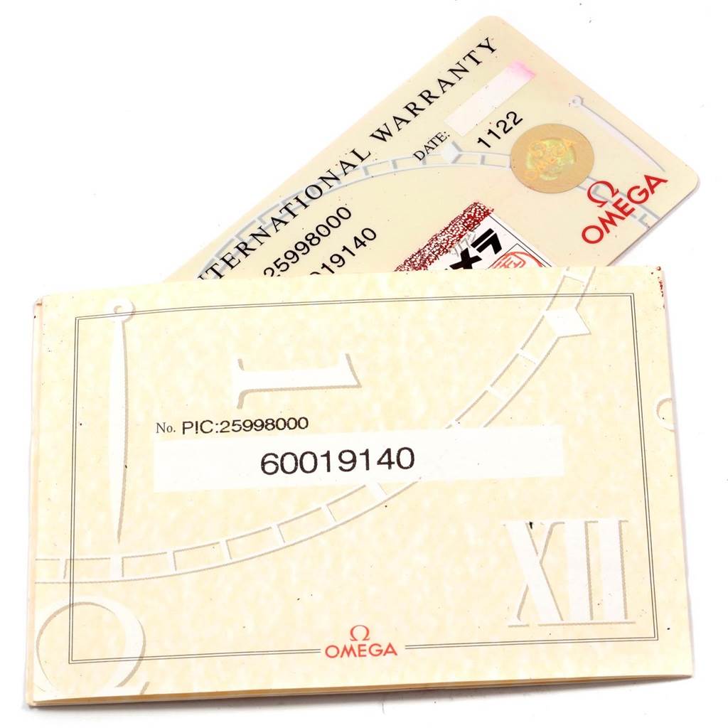 The image shows an international warranty card and paperwork for the Omega Seamaster 2599.80.00 Men
s Stainless Steel Blue Dial 2599.80.00 Men
s Stainless Steel Blue Dial model.