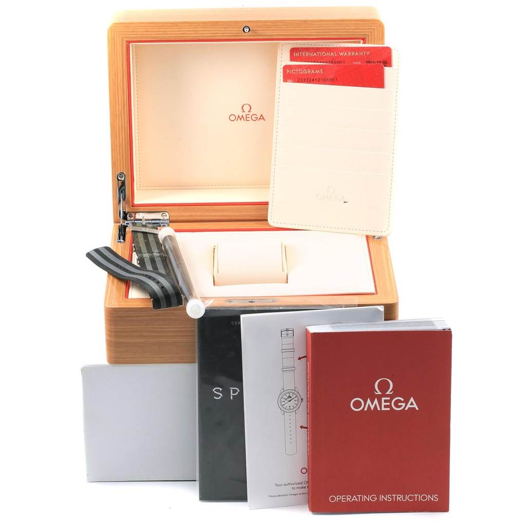 The image shows the packaging and accessories for the Omega Seamaster 233.32.41.21.01.001 Men
s Stainless Steel Black Dial 233.32.41.21.01.001 Men
s Stainless Steel Black Dial watch, including a wooden box, manuals, and extra strap.