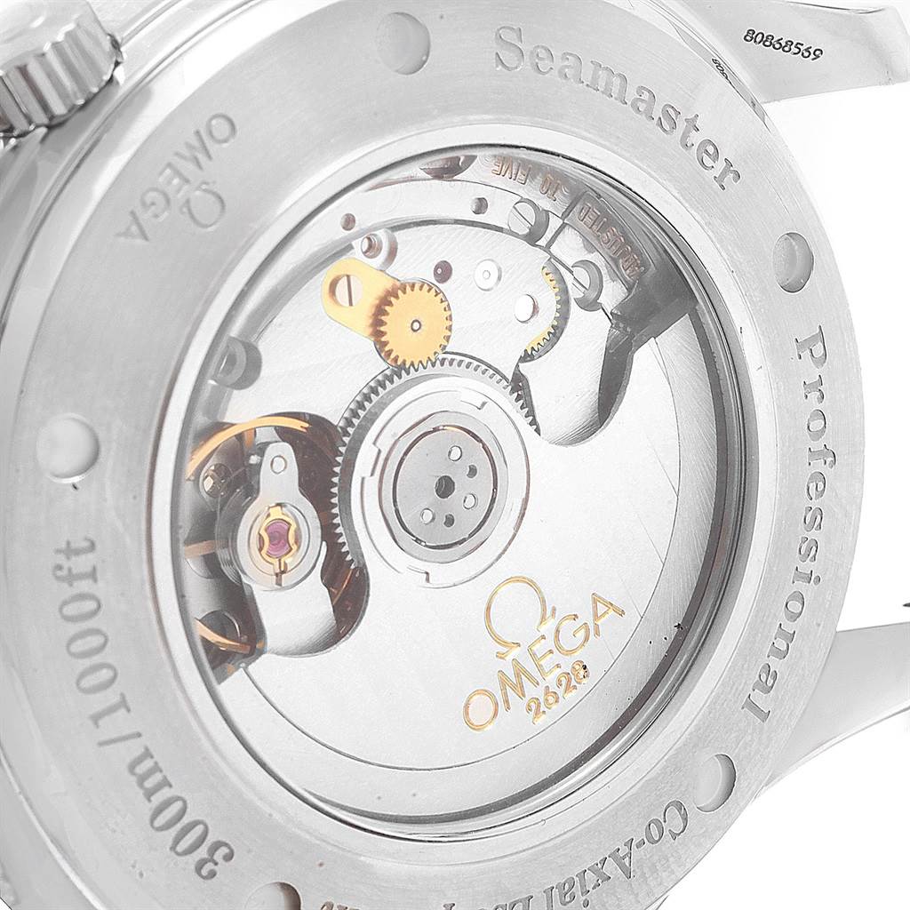 The image shows the back of an Omega Seamaster 2535.80.00 Men
s Stainless Steel Blue Dial 2535.80.00 Men
s Stainless Steel Blue Dial watch, highlighting its internal mechanisms and the "Seamaster" engraving.