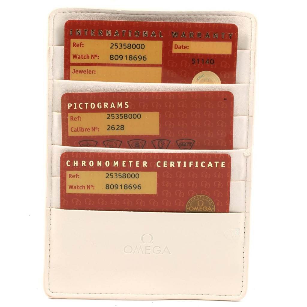 The image shows warranty, pictogram, and chronometer certificate cards for the Omega Seamaster 2535.80.00 Men
s Stainless Steel Blue Dial 2535.80.00 Men
s Stainless Steel Blue Dial model.