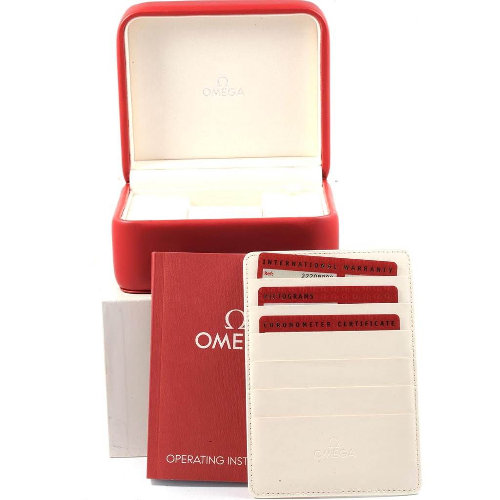 This image shows the packaging and documentation, including warranty cards, for an Omega Seamaster 2220.80.00 Men
s Stainless Steel Blue Dial 2220.80.00 Men
s Stainless Steel Blue Dial watch.