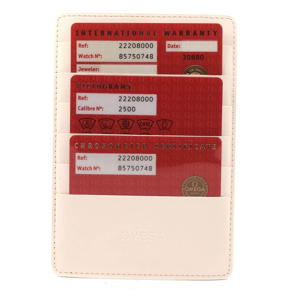 The image shows warranty and certification cards for the Omega Seamaster 2220.80.00 Men
s Stainless Steel Blue Dial 2220.80.00 Men
s Stainless Steel Blue Dial model, presented in a white cardholder.