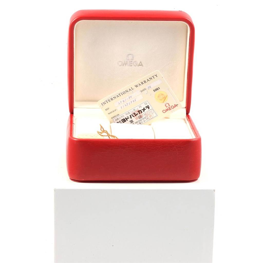 The image shows an Omega Seamaster 2541.80.00 Men
s Stainless Steel Blue Dial 2541.80.00 Men
s Stainless Steel Blue Dial watch box, warranty card, and tags, all angled frontally.