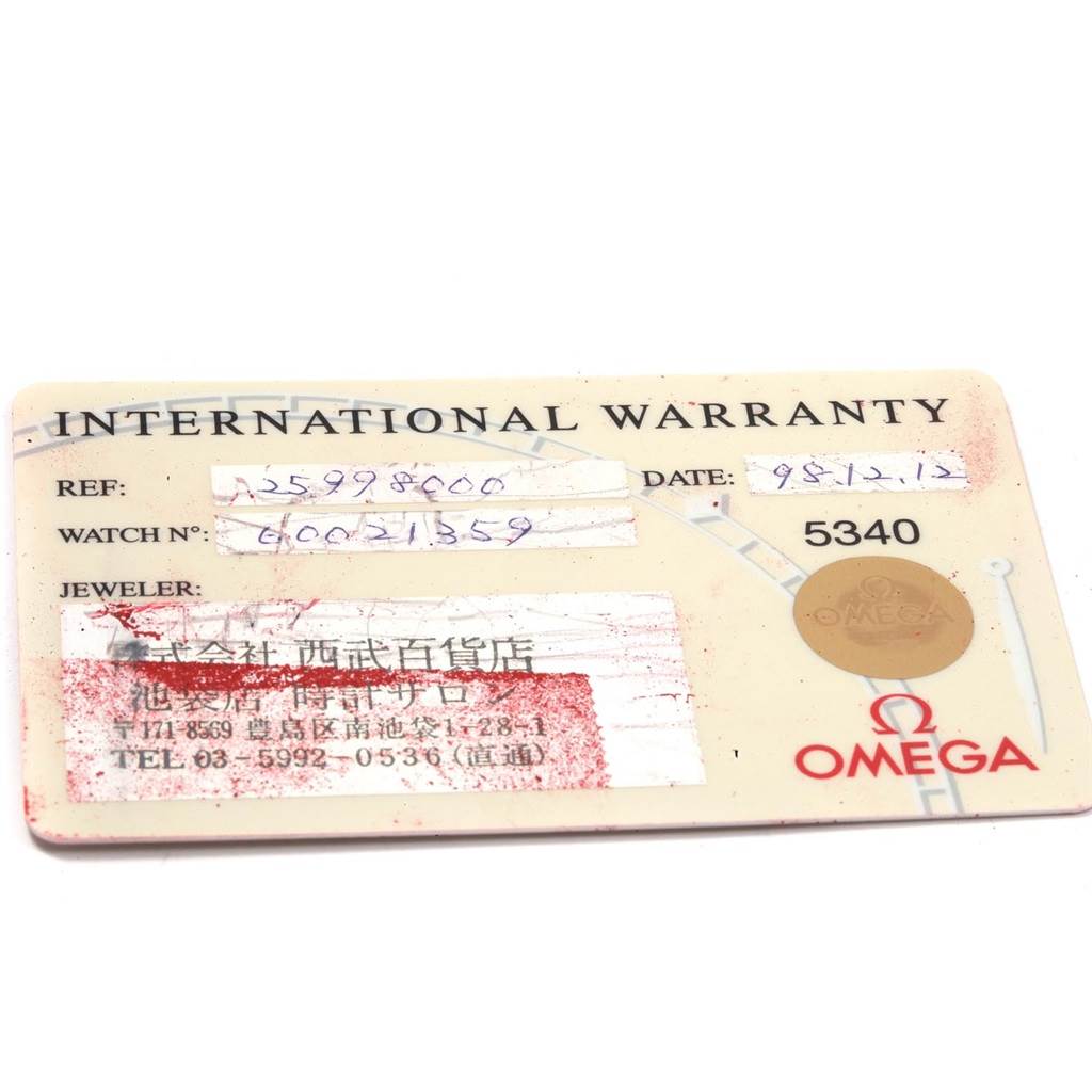 The image shows an International Warranty card for an Omega Seamaster 2599.80.00 Men
s Stainless Steel Blue Dial 2599.80.00 Men
s Stainless Steel Blue Dial watch, displaying the reference number, watch number, and jeweler information.