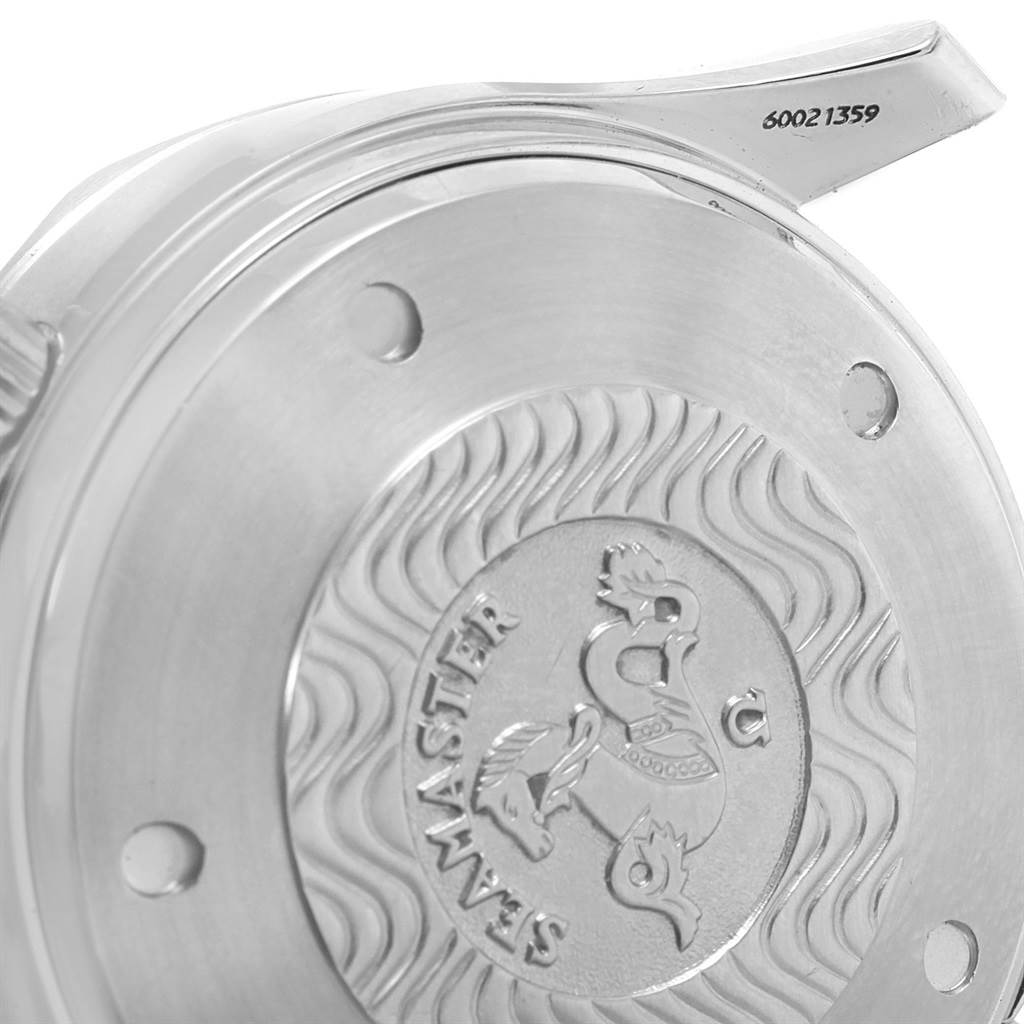 The image shows the back case of an Omega Seamaster 2599.80.00 Men
s Stainless Steel Blue Dial 2599.80.00 Men
s Stainless Steel Blue Dial watch from a close-up angle, highlighting the engraving details and serial number.