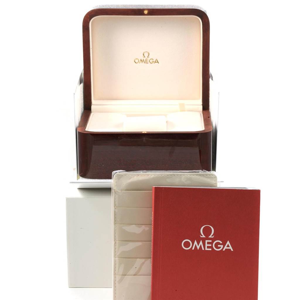 The image shows an opened Omega Ploprof 224.32.55.21.01.002 Men's Stainless Steel Black Dial 224.32.55.21.01.002 Men's Stainless Steel Black Dial model watch box, along with Omega-branded documentation placed in front.