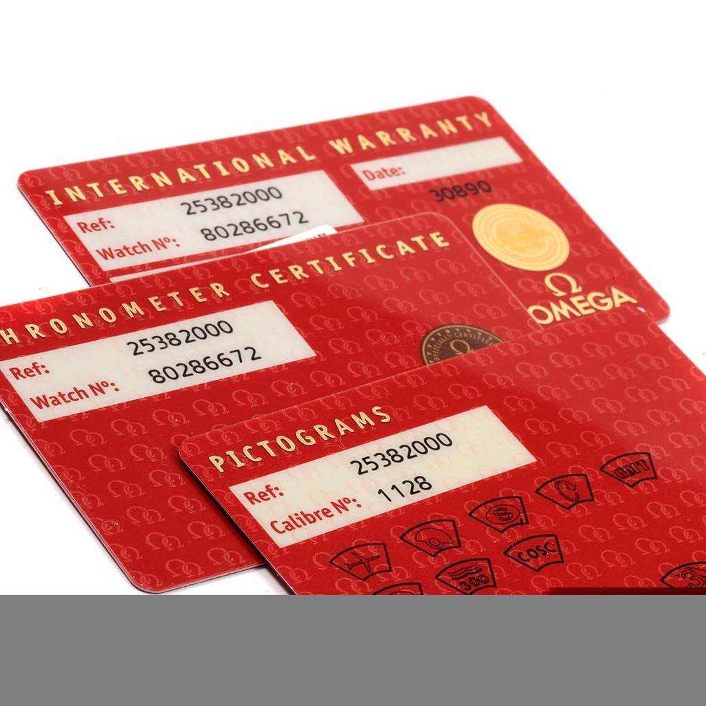 The image shows warranty and certification cards for an Omega Seamaster 2538.20.00 Men
s Stainless Steel White Dial 2538.20.00 Men
s Stainless Steel White Dial watch.