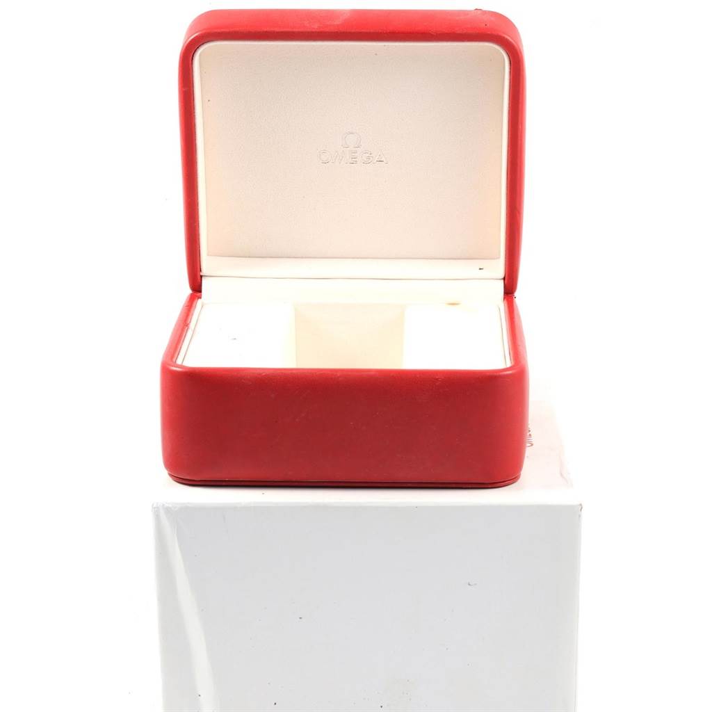 The image shows an open red Omega watch box for the Seamaster model, viewed from the front.