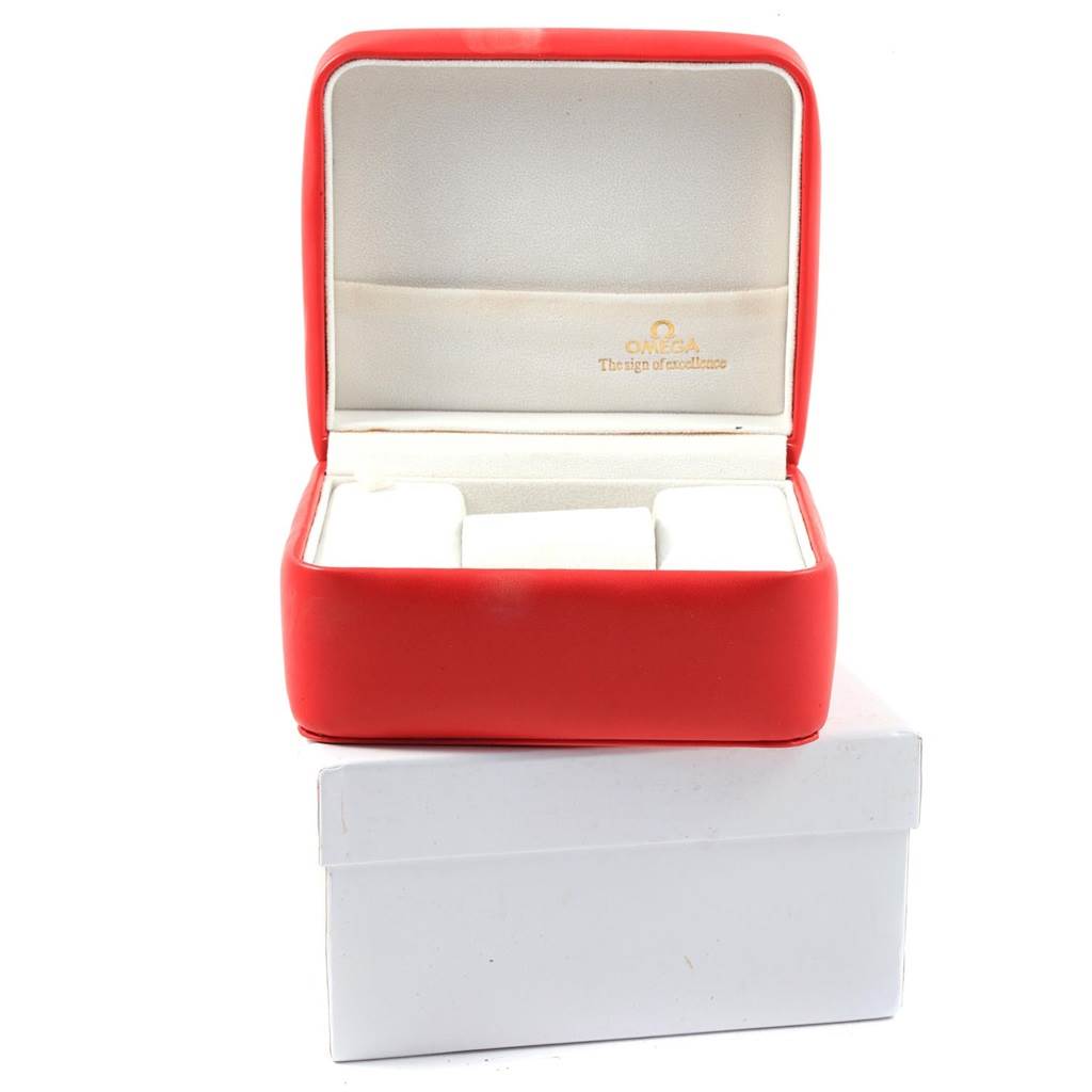 This image shows an open red Omega Seamaster 2536.50.00 Men's Stainless Steel Black Dial 2536.50.00 Men's Stainless Steel Black Dial watch box with white interior padding, resting on a white outer box.