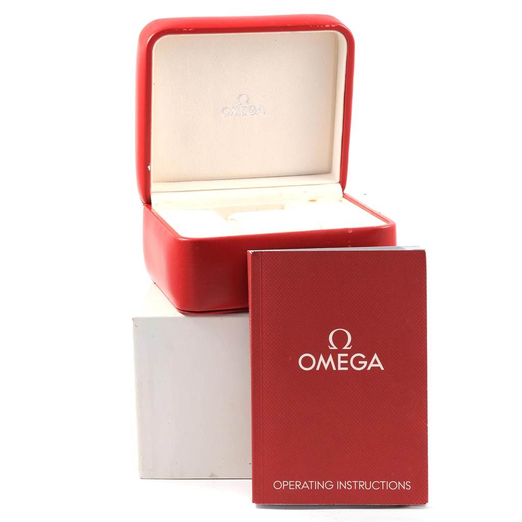 The image shows a red Omega Seamaster 2293.52.00 Men's Titanium Black Dial 2293.52.00 Men's Titanium Black Dial watch box and the operating instructions manual placed in front of it.