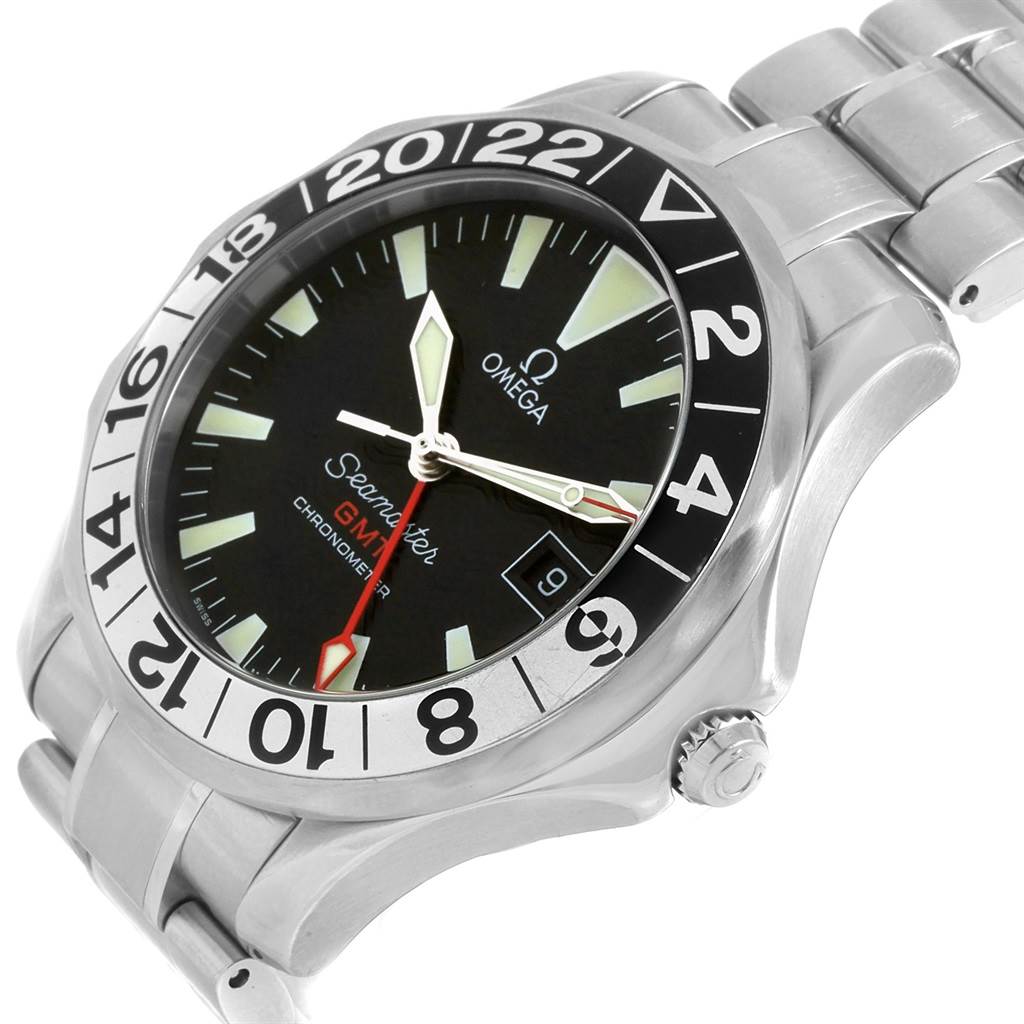 The image shows an Omega Seamaster 2234.50.00 Men
s Stainless Steel Black Dial 2234.50.00 Men
s Stainless Steel Black Dial GMT Chronometer watch at an angle, displaying the face, bezel, crown, and metal bracelet.