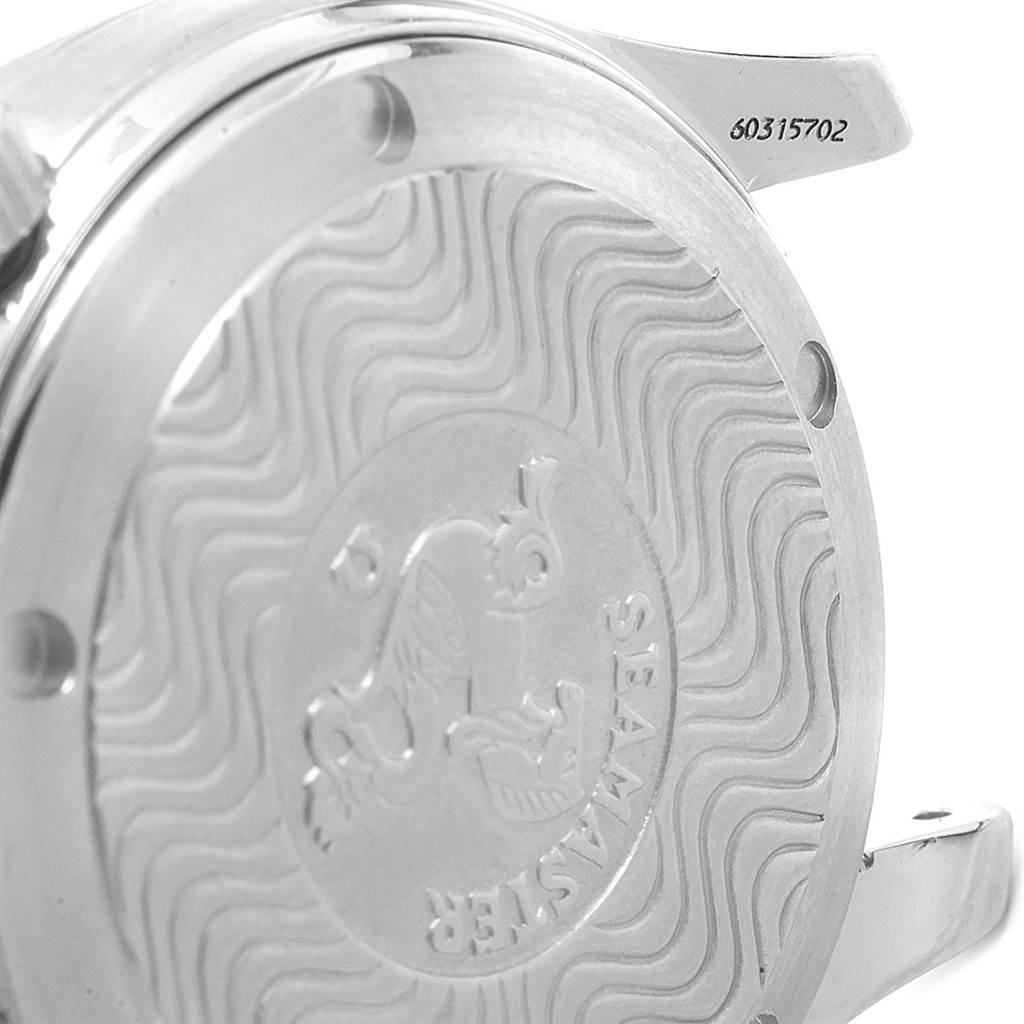 The image shows the case back of an Omega Seamaster 2551.80.00 Men
s Stainless Steel Blue Dial 2551.80.00 Men
s Stainless Steel Blue Dial watch with its engraved wave pattern and logo.