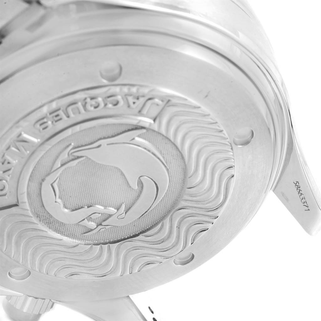 The image shows the back case of the Omega Seamaster 2595.30.00 Men
s Stainless Steel Silver Dial 2595.30.00 Men
s Stainless Steel Silver Dial watch, highlighting the embossed design and markings.