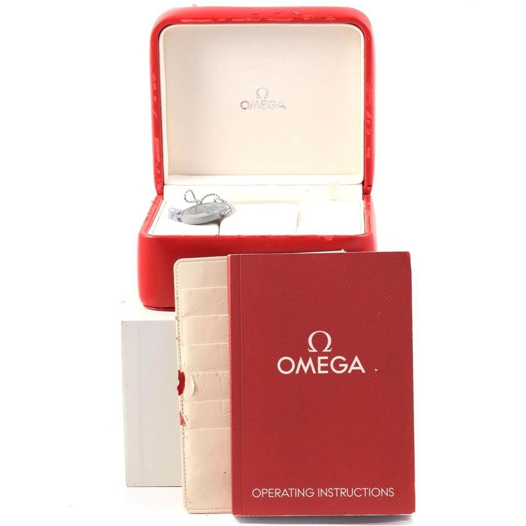 The image shows an Omega Seamaster 2220.80.00 Men
s Stainless Steel Blue Dial 2220.80.00 Men
s Stainless Steel Blue Dial watch box along with an operating instructions manual and a cardholder.