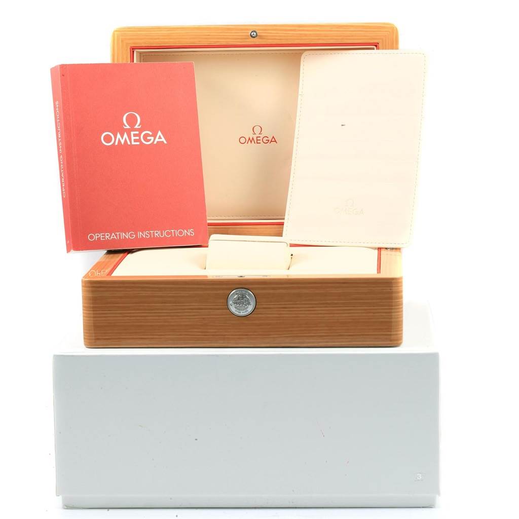 The image shows the box, operating instructions, and leather pouch of an Omega Seamaster 232.30.44.22.03.001 Men
s Stainless Steel Blue Dial 232.30.44.22.03.001 Men
s Stainless Steel Blue Dial watch.