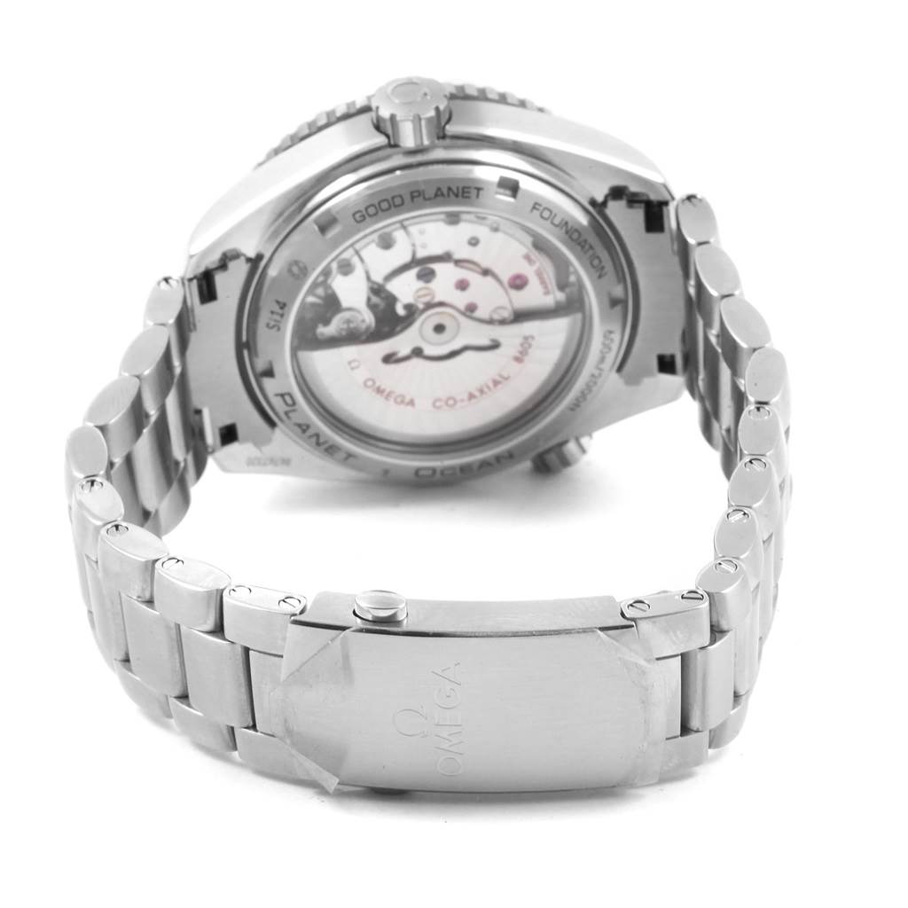 The image shows the back view of the Omega Seamaster 232.30.44.22.03.001 Men
s Stainless Steel Blue Dial 232.30.44.22.03.001 Men
s Stainless Steel Blue Dial watch, highlighting the movement and bracelet.