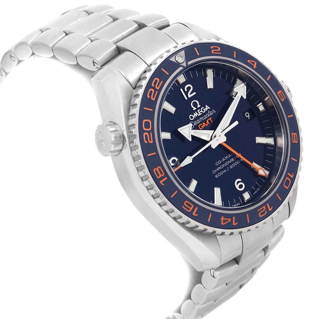 The image displays an angled side view of an Omega Seamaster 232.30.44.22.03.001 Men
s Stainless Steel Blue Dial 232.30.44.22.03.001 Men
s Stainless Steel Blue Dial watch, showcasing part of the dial, bezel, crown, and metal bracelet.