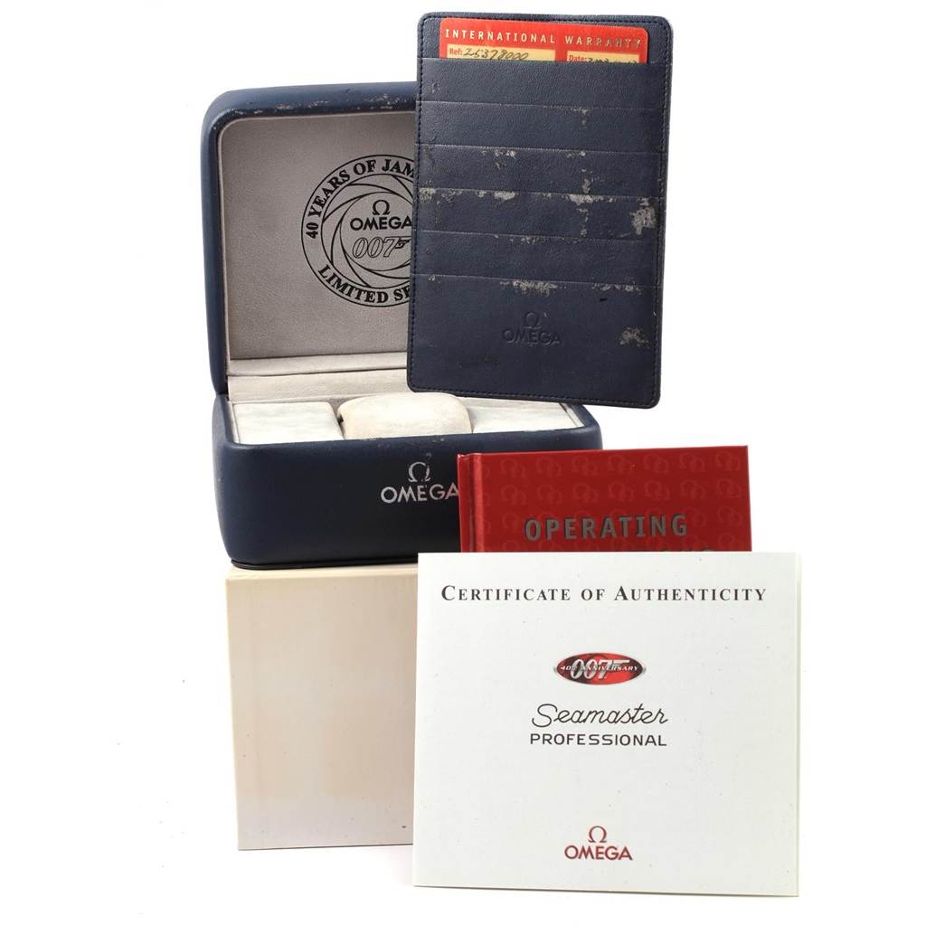 The image shows the Omega Seamaster 2537.80.00 Stainless Steel Blue Dial 2537.80.00 Stainless Steel Blue Dial watch box, International Warranty Card, Operating Manual, and Certificate of Authenticity.