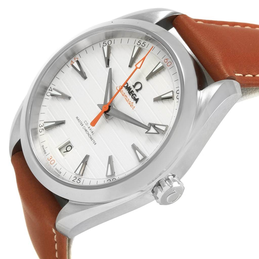 The image shows a close-up, angled view of the Omega Seamaster 220.12.41.21.02.001 Men
s Stainless Steel Silver Dial 220.12.41.21.02.001 Men
s Stainless Steel Silver Dial watch face and crown with a brown leather strap.