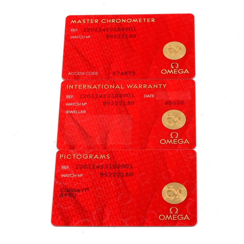 The image shows three Omega warranty and certification cards for the Seamaster model, displayed flat.