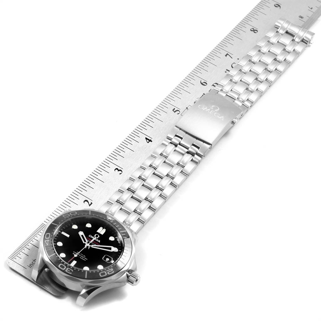 The image shows the Omega Seamaster 212.30.41.20.01.003 Men
s Stainless Steel Black Dial 212.30.41.20.01.003 Men
s Stainless Steel Black Dial watch laid flat with the dial, case, and bracelet visible, alongside a ruler.