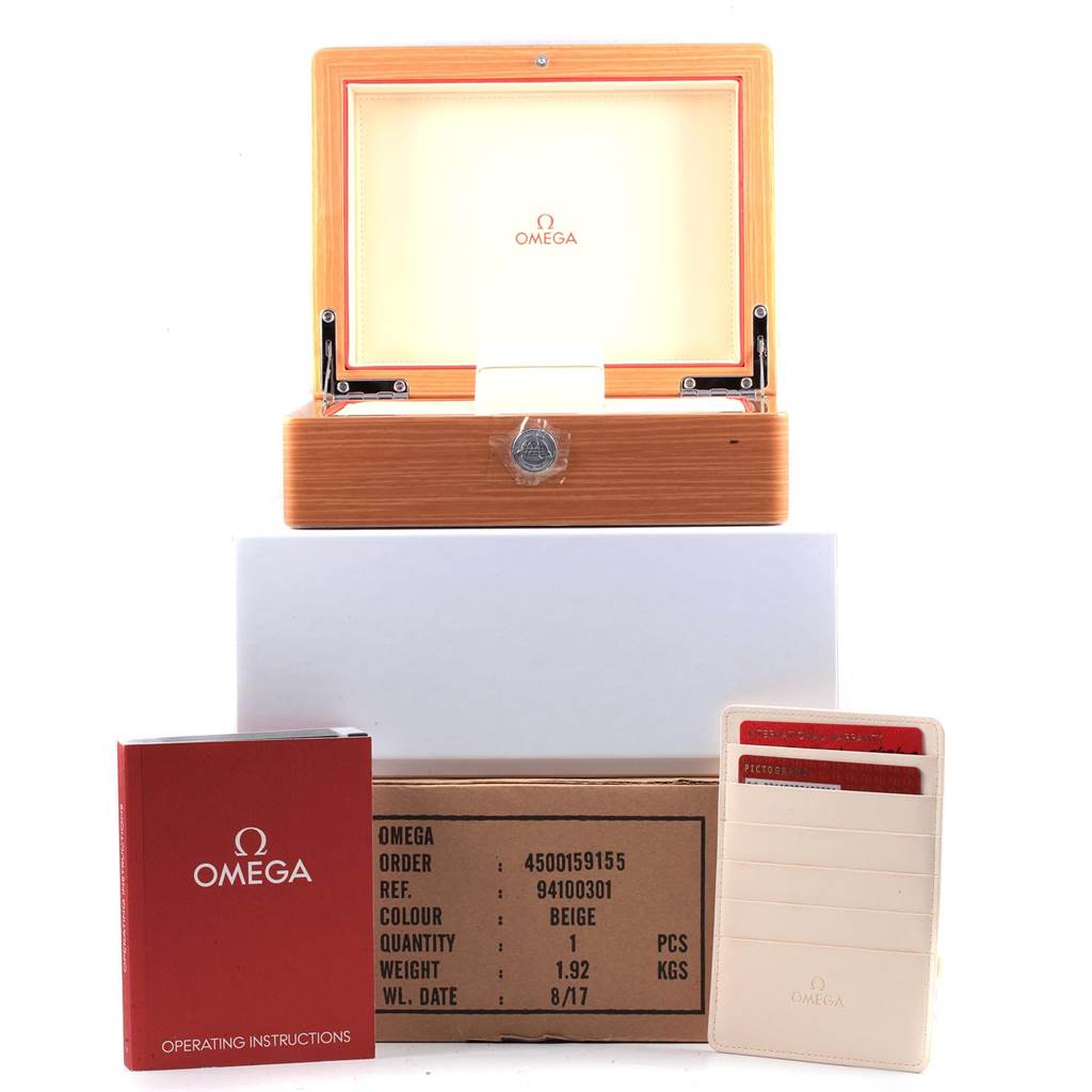 The image shows a wooden Omega Seamaster 231.10.39.21.02.001 Men
s Stainless Steel Silver Dial 231.10.39.21.02.001 Men
s Stainless Steel Silver Dial watch box, Omega operating instructions, a cardholder, and a cardboard shipping box.