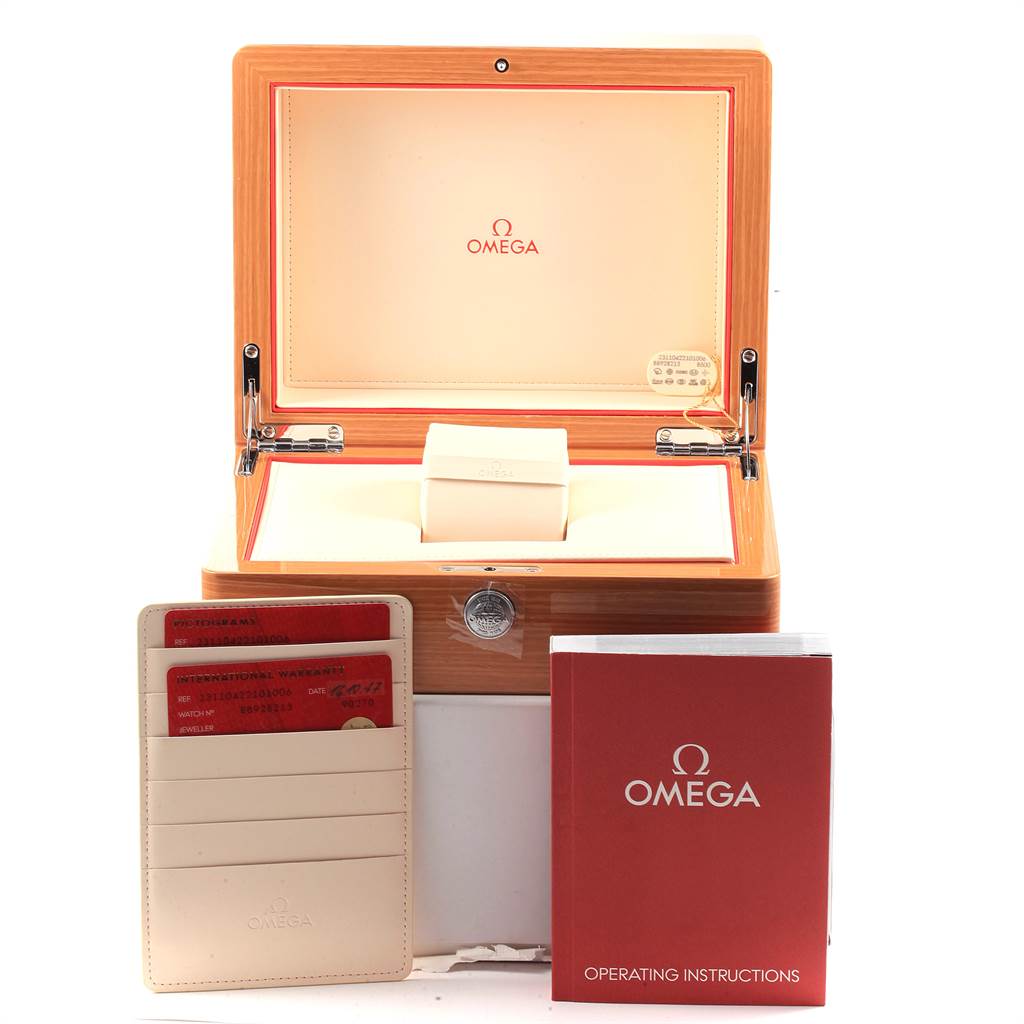 The image shows the opened watch box, warranty cards, and operating instructions for an Omega Seamaster 231.10.42.21.01.006 Men
s Stainless Steel Black Dial 231.10.42.21.01.006 Men
s Stainless Steel Black Dial watch.