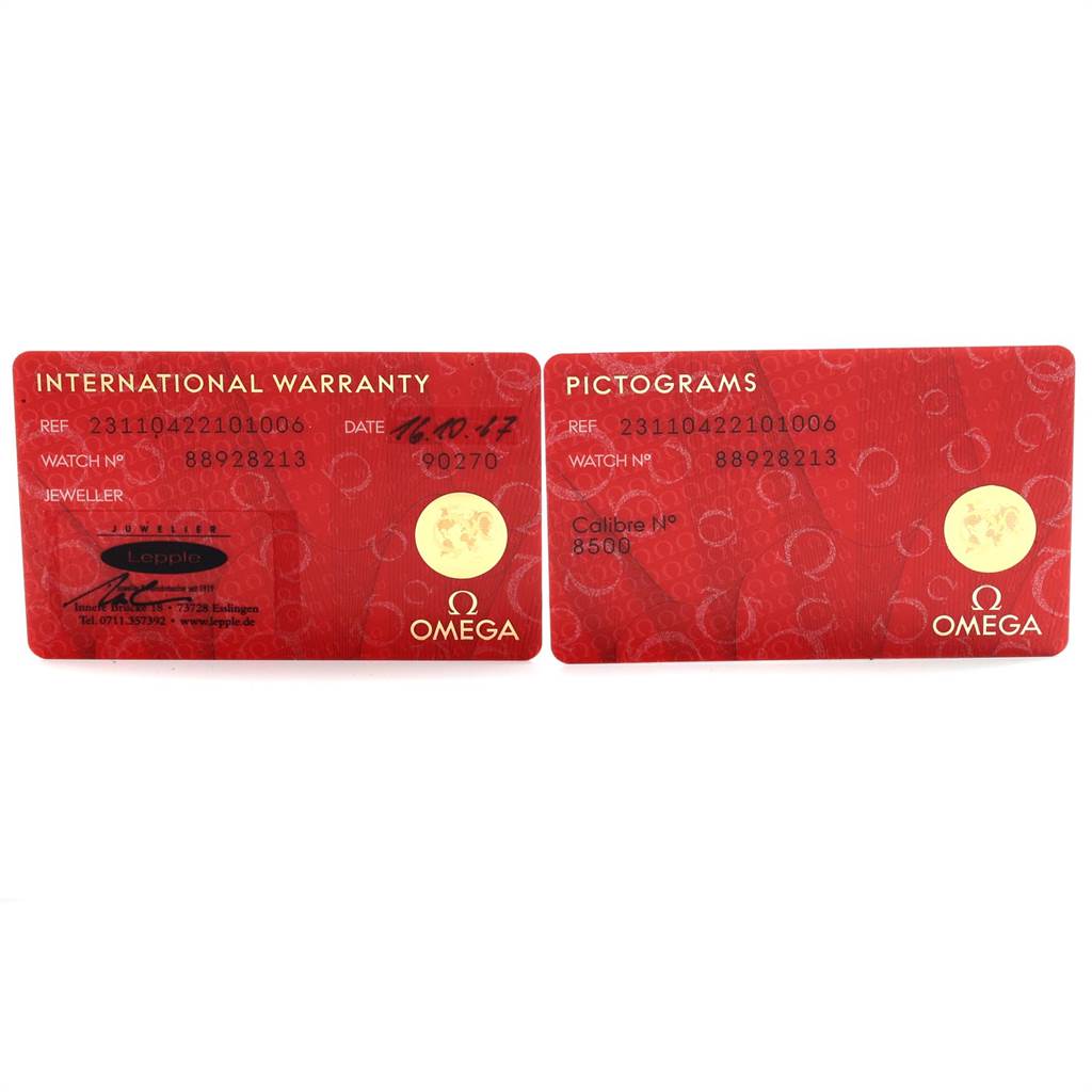 The image shows the front of two red cards: the International Warranty and Pictograms cards for an Omega Seamaster 231.10.42.21.01.006 Men
s Stainless Steel Black Dial 231.10.42.21.01.006 Men
s Stainless Steel Black Dial watch.