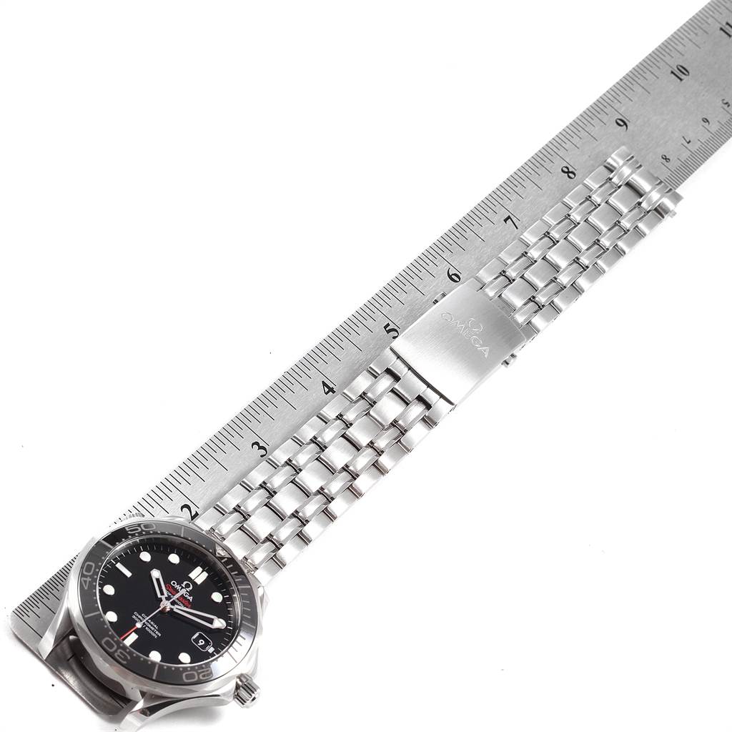 The image shows an Omega Seamaster 212.30.41.20.01.003 Men
s Stainless Steel Black Dial 212.30.41.20.01.003 Men
s Stainless Steel Black Dial watch laid flat with a stainless steel strap, positioned alongside a ruler for size reference.