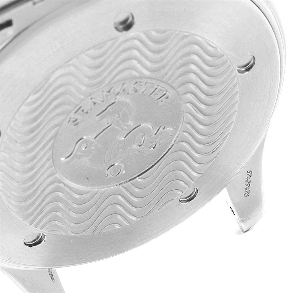 This is a close-up of the back case of an Omega Seamaster 2264.50.00 Men
s Stainless Steel Black Dial 2264.50.00 Men
s Stainless Steel Black Dial watch, showing the wave pattern and the Seamaster logo engraving.