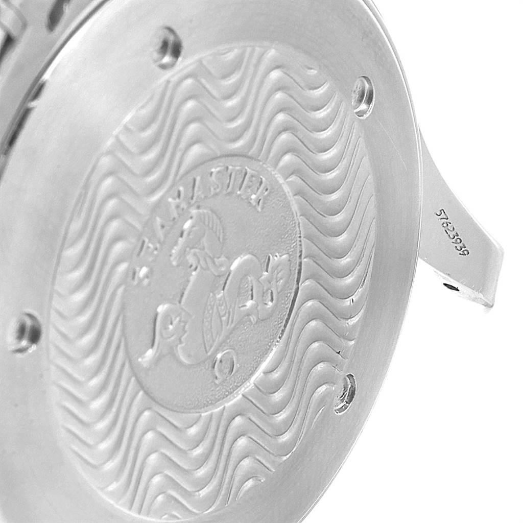 The image shows the back case of an Omega Seamaster 2541.80.00 Men
s Stainless Steel Blue Dial 2541.80.00 Men
s Stainless Steel Blue Dial watch with its distinctive wave pattern and logo.