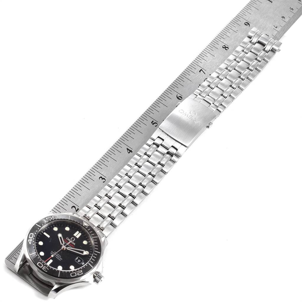 The image shows an Omega Seamaster 212.30.41.20.01.003 Men
s Stainless Steel Black Dial 212.30.41.20.01.003 Men
s Stainless Steel Black Dial watch laid flat beside a ruler, highlighting its stainless steel bracelet and clasp.