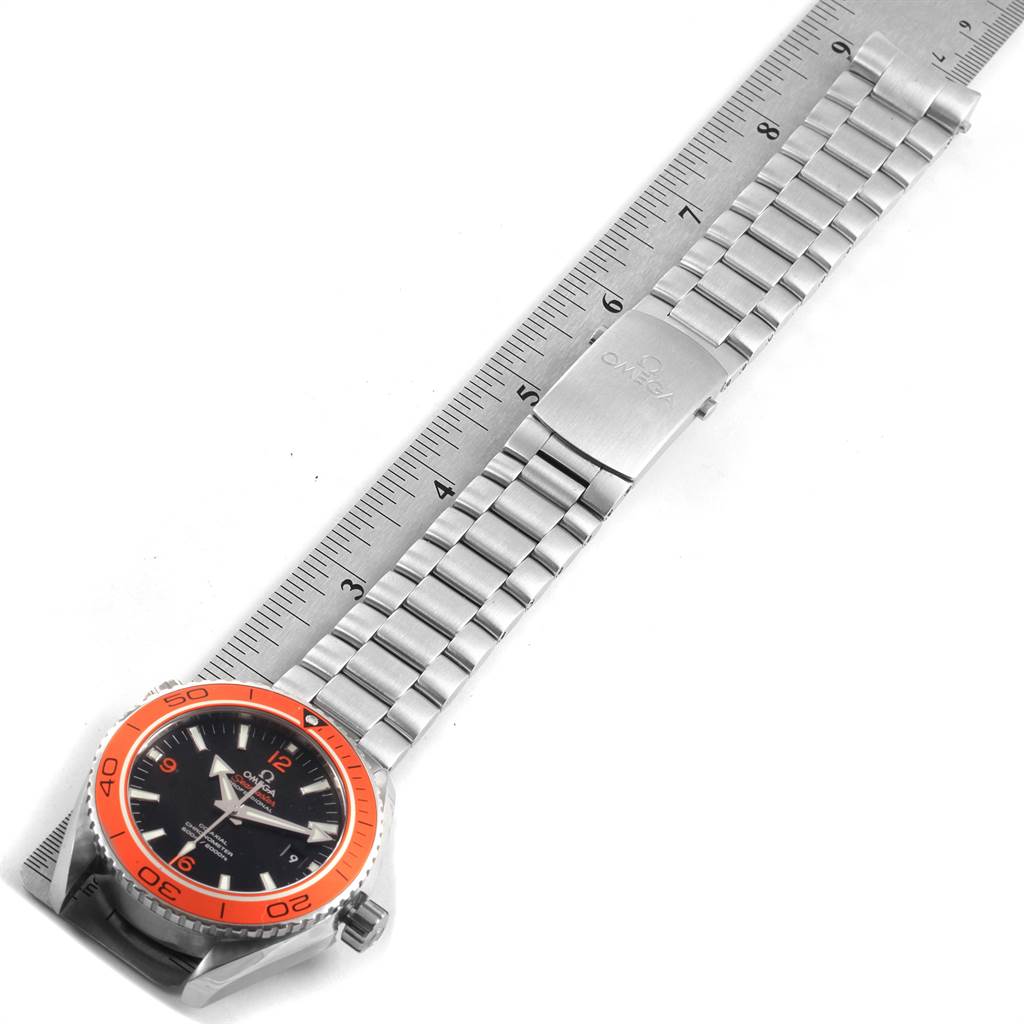 The image shows an Omega Seamaster 232.30.46.21.01.002 Men
s Stainless Steel Black Dial 232.30.46.21.01.002 Men
s Stainless Steel Black Dial watch laid flat with its bracelet extended next to a ruler for measurement.