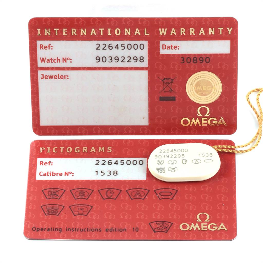 The image shows the international warranty and pictogram cards for the Omega Seamaster 2264.50.00 Men
s Stainless Steel Black Dial 2264.50.00 Men
s Stainless Steel Black Dial model, along with a tag.