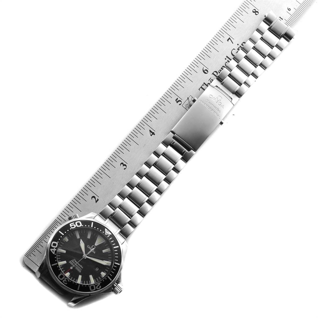 The image shows the Omega Seamaster 2264.50.00 Men
s Stainless Steel Black Dial 2264.50.00 Men
s Stainless Steel Black Dial watch laid flat with its metal bracelet and the face partially visible alongside a ruler for scale.
