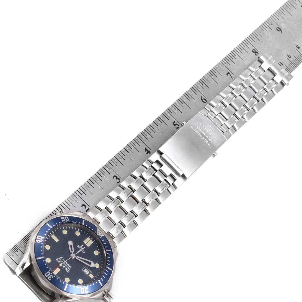 This Omega Seamaster 2541.80.00 Men
s Stainless Steel Blue Dial 2541.80.00 Men
s Stainless Steel Blue Dial watch is shown from a top-down angle, displaying its bracelet, clasp, and part of the dial.