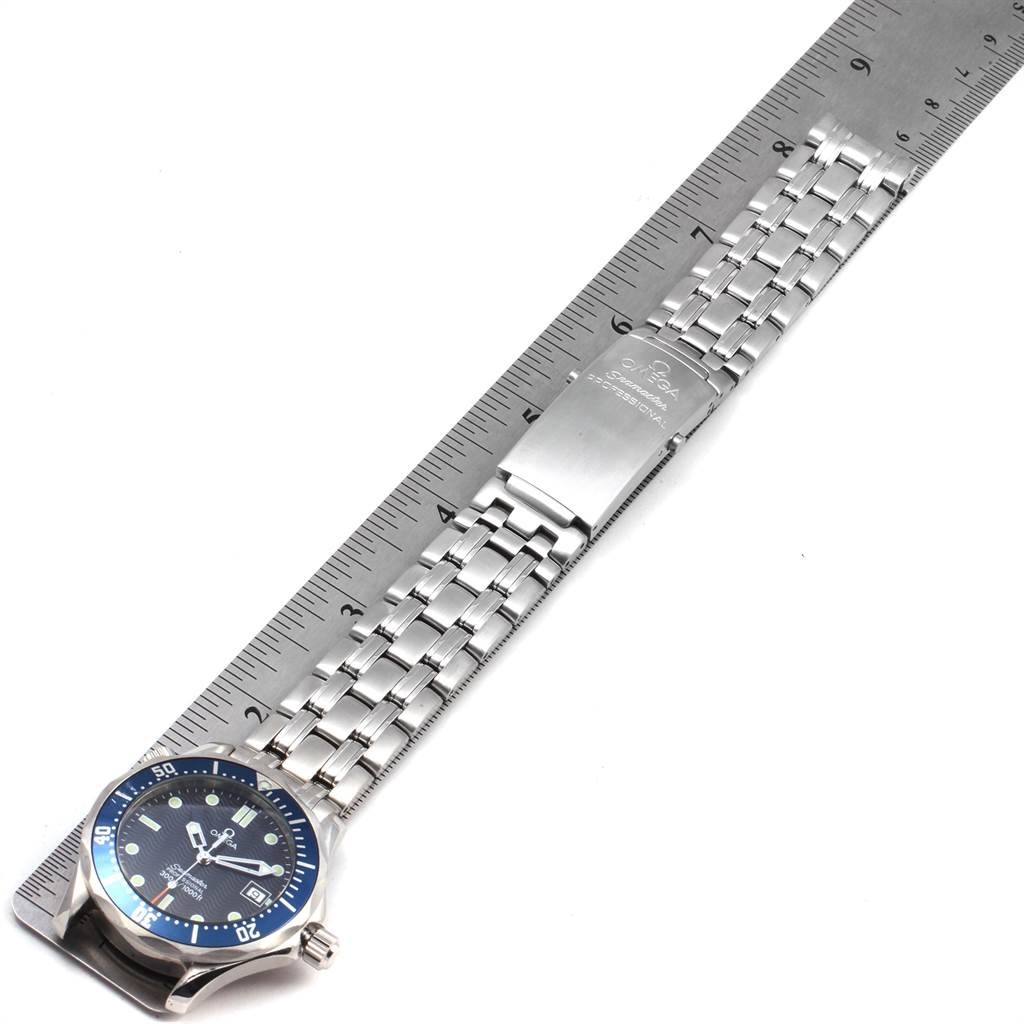 The image shows the full body and bracelet of the Omega Seamaster 2561.80.00 Men
s Stainless Steel Blue Dial 2561.80.00 Men
s Stainless Steel Blue Dial watch, placed next to a ruler for scale.