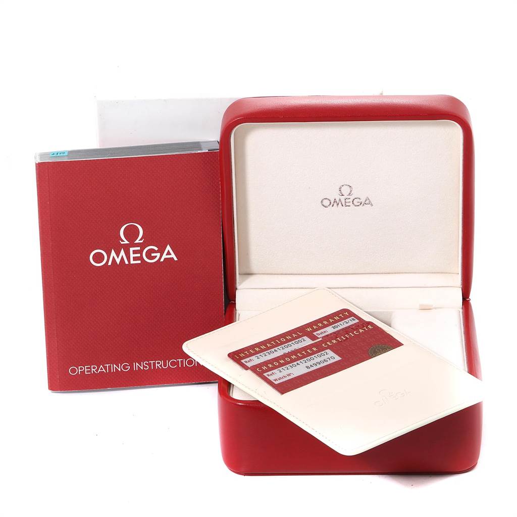 The image shows accessories for an Omega Seamaster 212.30.41.20.01.002 Men
s Stainless Steel Black Dial 212.30.41.20.01.002 Men
s Stainless Steel Black Dial, including an open box, operating instructions, and a warranty card.